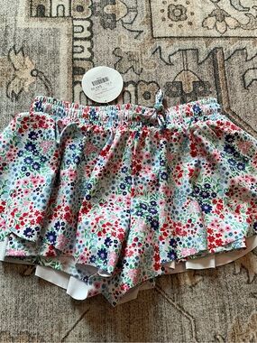 Girls White Floral Ruffle Skort with Multicolor Blossoms